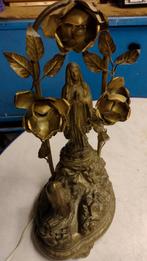 Beeld Lourdes van Maria Bernadette met muziek, Ophalen