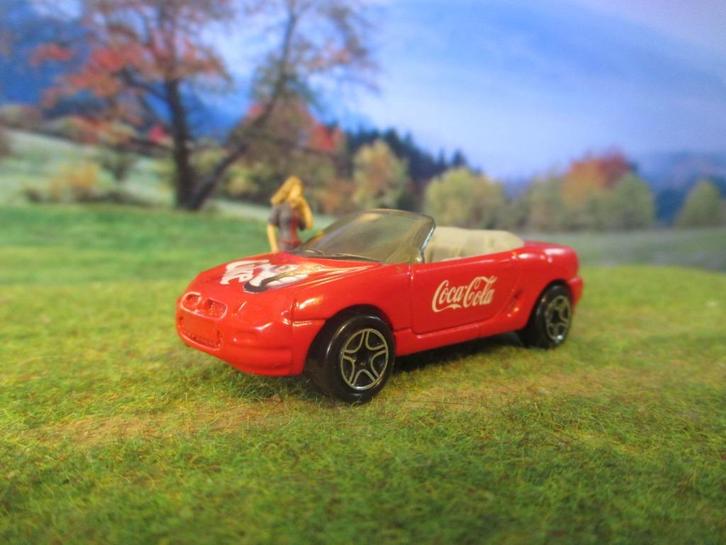 1:56 MG MG/F 1997 - MBX Coca Cola, Hobby en Vrije tijd, Modelauto's | Overige schalen, Zo goed als nieuw, Bus of Vrachtwagen, Ophalen of Verzenden