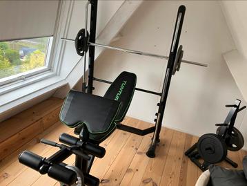 Tunturi sm60 halterbank met 100kg gewichten beschikbaar voor biedingen