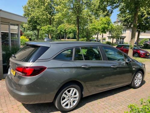 Opel Astra 1.0 Turbo 77KW (105 pk) Sports Tourer 2018 Grijs, Auto's, Opel, Particulier, Astra, ABS, Airbags, Airconditioning, Android Auto