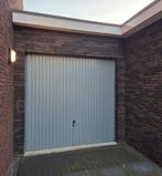 Nog goed werkende garagedeur, Ophalen