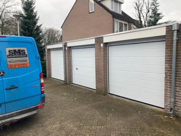 kanteldeuren en geisoleerde sectionaaldeuren beschikbaar voor biedingen