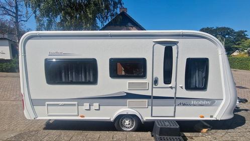 Hobby 460 lu bouwjaar 2012, Caravans en Kamperen, Caravans, Particulier, tot en met 4, 1000 - 1250 kg, Rondzit, Hobby, 2 aparte bedden