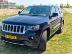 Jeep Grand Cherokee WK2 Overland – Donkerblauw metallic, Auto's, Jeep, Automaat, 2268 kg, Zwart, Blauw