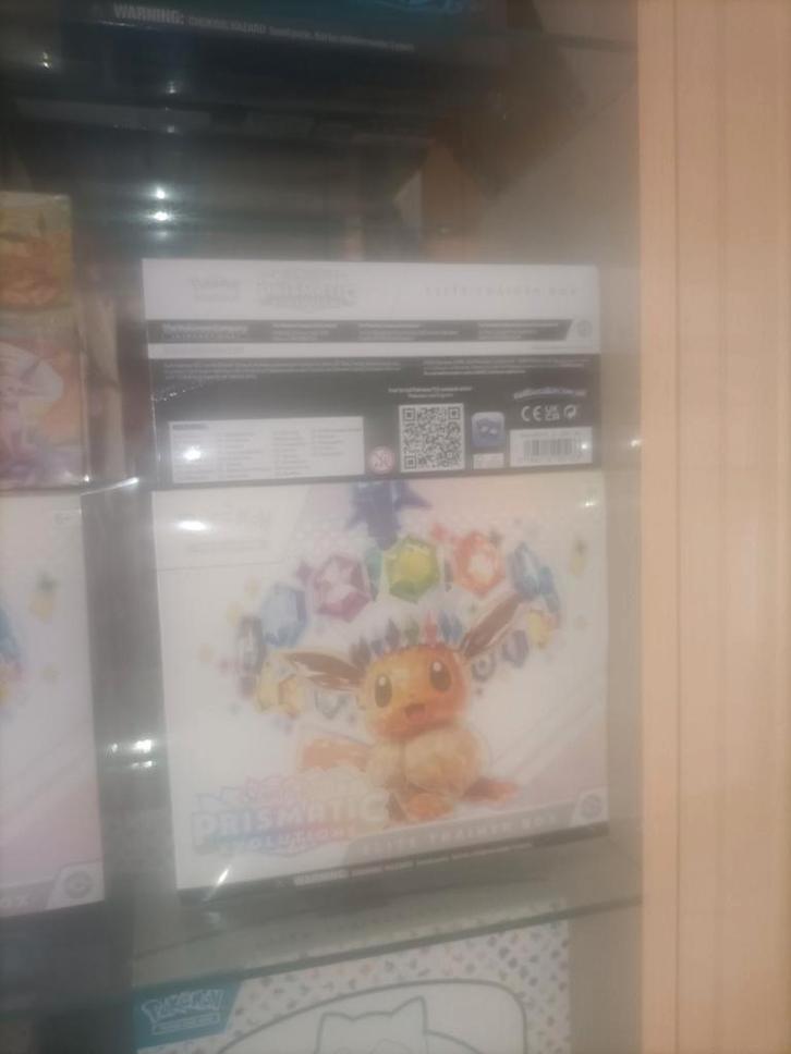 Prismatic evolutions ETB, Hobby en Vrije tijd, Verzamelkaartspellen | Pokémon, Ophalen of Verzenden