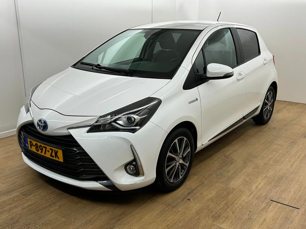 Toyota Yaris Occasion 1.5 Hybrid Dynamic | Wit | Tweedehands, Auto's, Euro 6, 4 cilinders, Lichtsensor, Wit