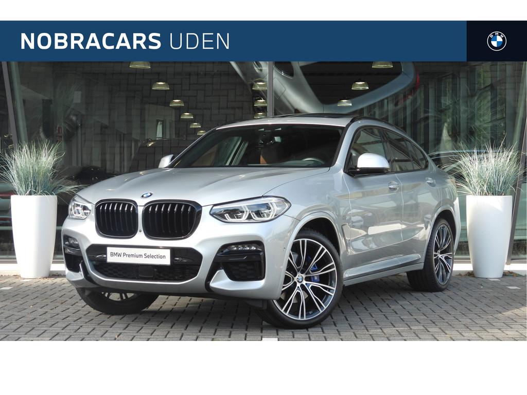 BMW X4 M40i Automaat / Panoramadak / Trekhaak / Sportstoelen, Gebruikt, Stoelverwarming, Met garantie (alle), Leder