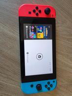 Nintendo Switch met rode en blauwe Joy-Cons, Ophalen of Verzenden, Gebruikt, Met 2 controllers, Switch Original
