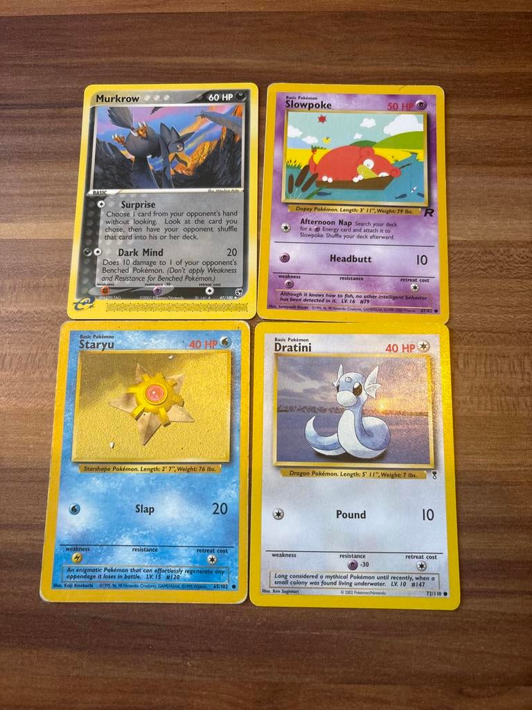 Diverse Pokémon kaarten: Murkrow, Slowpoke, Staryu, Dratini, Ophalen of Verzenden, Zo goed als nieuw, Meerdere kaarten, Foil