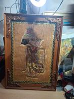 Ingelijste Wayang Kulit pop op koeienhuid, Ophalen