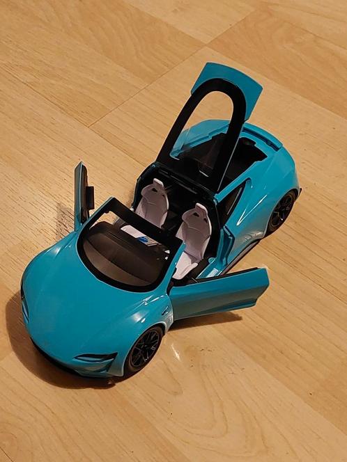 Tesla roadster schaalmodel 1:24., Hobby en Vrije tijd, Modelauto's | 1:24, Nieuw, Auto, Ophalen of Verzenden