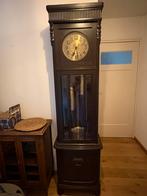 Staande antieke klok, Ophalen