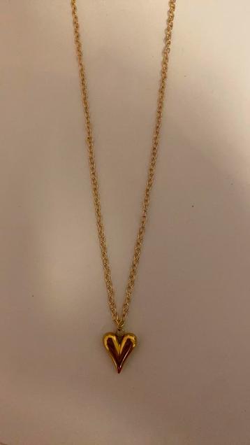 Gouden harten ketting beschikbaar voor biedingen
