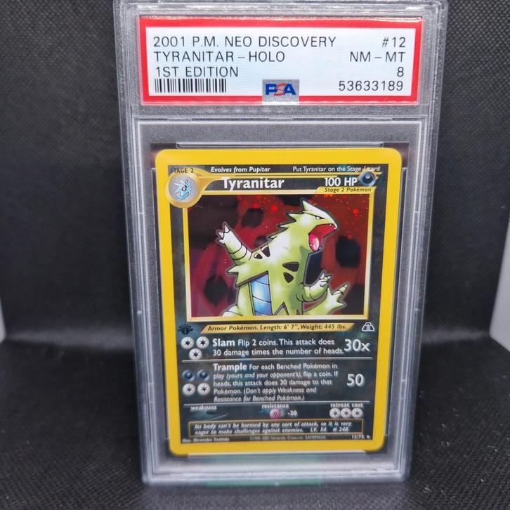 Tyranitar Holo 1st Edition Neo Discovery PSA 8, Hobby en Vrije tijd, Verzamelkaartspellen | Pokémon, Zo goed als nieuw, Ophalen of Verzenden