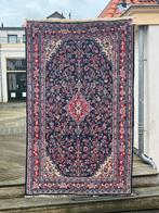Gekleurd Marrokaans tapijt, Ophalen