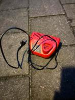 Milwaukee 12v accu lader in nieuwstaat., Ophalen of Verzenden, Nvt, Nvt, Milwaukee