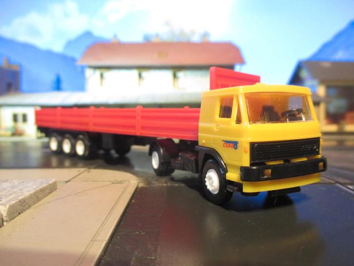 LIAZ 110 met open oplegger - Igra geel-rood NU VOOR € 7,50, Hobby en Vrije tijd, Modelauto's | 1:87, Nieuw, Bus of Vrachtwagen