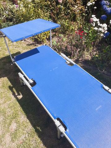 Aluminium ligstoel met zonnedak beschikbaar voor biedingen