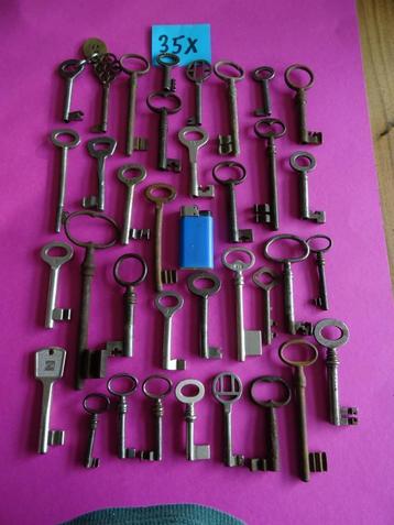 35 oude antieke sleutels sleutel slot sloten kist kast deur  beschikbaar voor biedingen