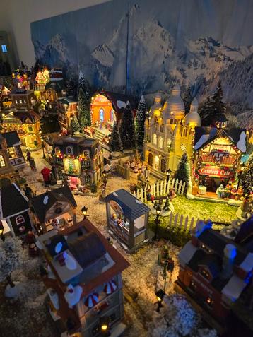Groot zeer compleet kerstdorp beschikbaar voor biedingen