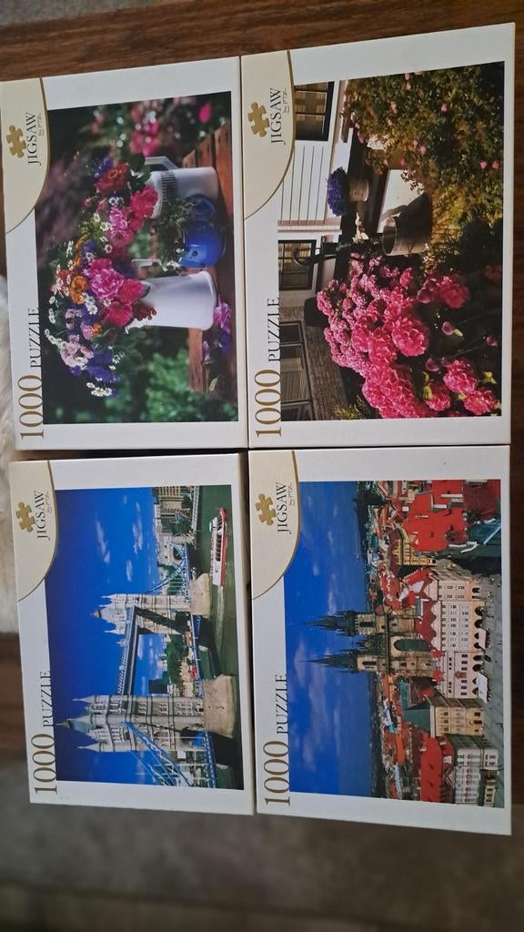 Jigsaw puzzels 4 stuks 1000 stukjes, Ophalen of Verzenden, 500 t/m 1500 stukjes, Zo goed als nieuw