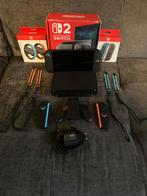 NINTENDO SWITCH 2 + EXTRA CONTROLLERS EN STUURTJES, Spelcomputers en Games, Spelcomputers | Nintendo Switch, Ophalen of Verzenden