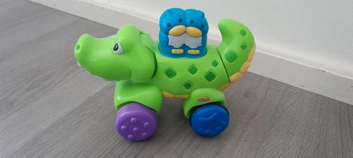 Te koop Fisher-Price pres en go krokodil, Kinderen en Baby's, Speelgoed | Fisher-Price, Zo goed als nieuw, Ophalen of Verzenden