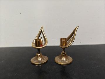 2koperen kandelaars beschikbaar voor biedingen