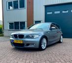 BMW 1-Serie 116i | M-sport | Clima | Cruise | Stoelverw, Auto's, BMW, 1-Serie, Achterwielaandrijving, 4 cilinders, Leder en Stof