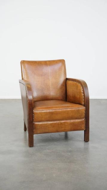 Unieke schapenleren en houten Art Deco design fauteuil beschikbaar voor biedingen