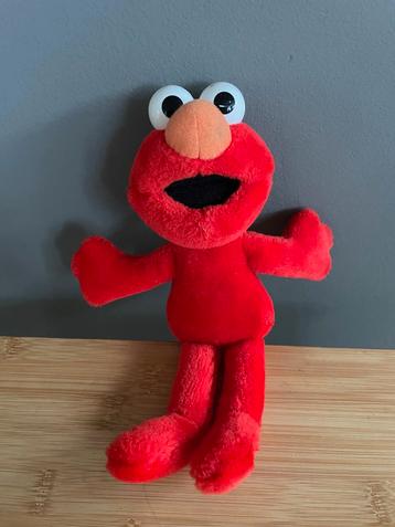 Originele Elmo knuffel beschikbaar voor biedingen