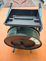 Omsnoeringsband met haspelwagen, Ophalen, Gebruikt