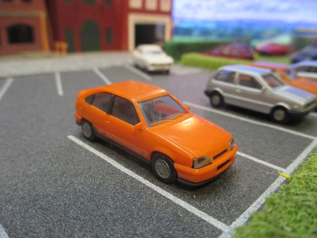 Opel Kadett E Gsi - Herpa oranje, Hobby en Vrije tijd, Ophalen of Verzenden, Zo goed als nieuw, Auto, Herpa