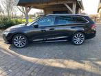 Skoda Octavia Combi 1.4 TSI iV PHEV Business Edition Plus, Auto's, Skoda, Gebruikt, 150 pk, Zwart, Plug-in hybride