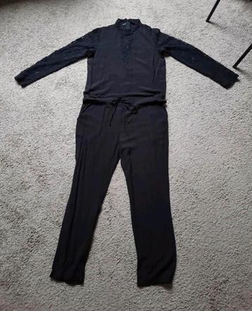 Zwarte jumpsuit maat 38 beschikbaar voor biedingen