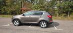 KIA SPORTAGE met lage kilometerstand., Auto's, Kia, Voorwielaandrijving, Bruin, 160 pk, Leder en Stof