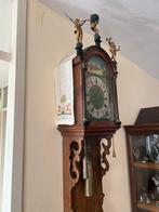 Antieke Friese staartklok, Ophalen