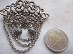12.  Heel aparte oude broche, Ophalen