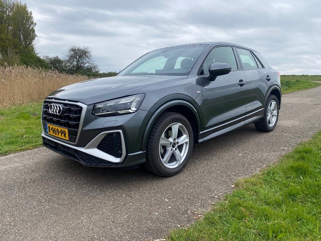 Audi Q2 35 TFSI 150pk S-edition S-Tronic Navi Cruise LED PDC, 4 cilinders, 150 pk, Origineel Nederlands, Grijs