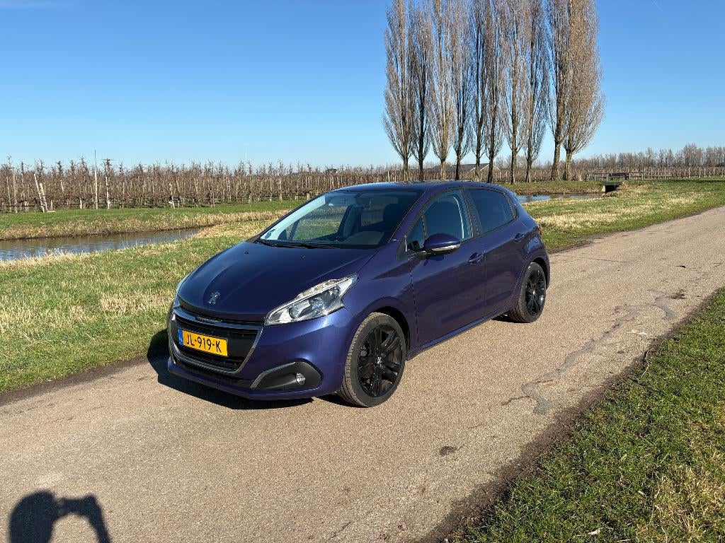 Peugeot 208 1.2 2016 km:98032  Goedgekeurd tot April 2027!, Auto's, Voorwielaandrijving, Stof, 1199 cc, Blauw