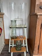 Glazen vazen, Ophalen