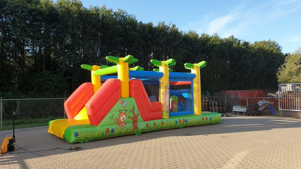 te huur  opblaasbaar stormbaan springkussen met glijbaan, Ophalen of Verzenden