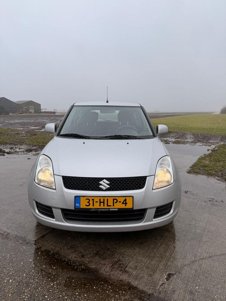 Suzuki Swift 1.3 3D 2009 Grijs, Stof, 31 €/maand, 1328 cc, Swift