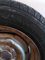 Reserve wiel met prima band, Ophalen