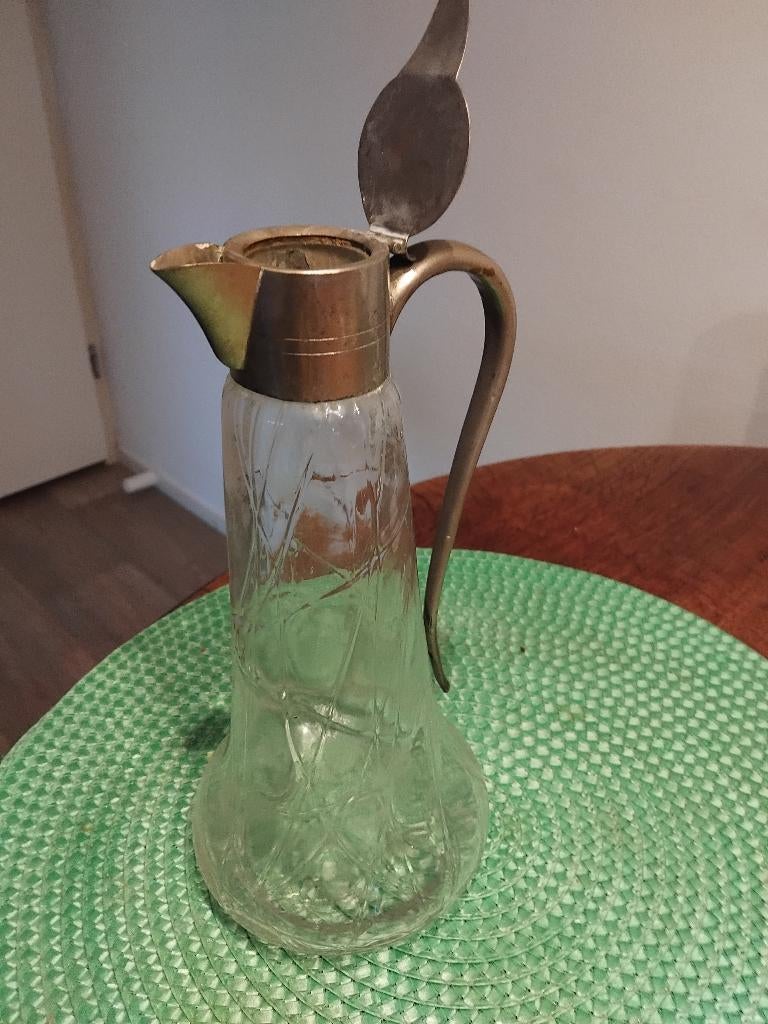 Kristallen karaf met tinnen deksel en handvat, Ophalen