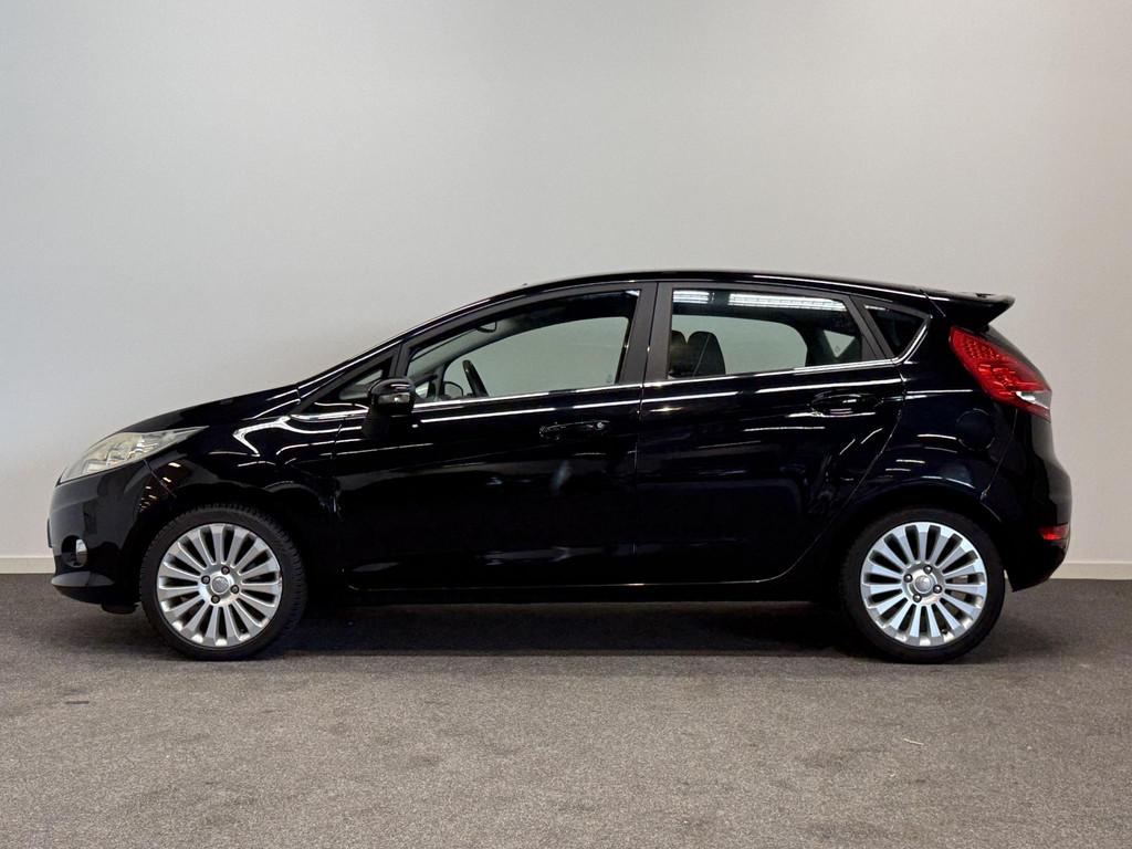 Ford Fiesta 1.4 Titanium Clima!, Auto's, Ford, Voorwielaandrijving, Stof, Zwart, Origineel Nederlands