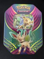 Evolutions celebration tin leafeon gx, Hobby en Vrije tijd, Verzamelkaartspellen | Pokémon, Verzenden, Nieuw, Booster