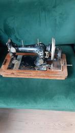 Oude naaimachine ( denk van Singer ), Ophalen