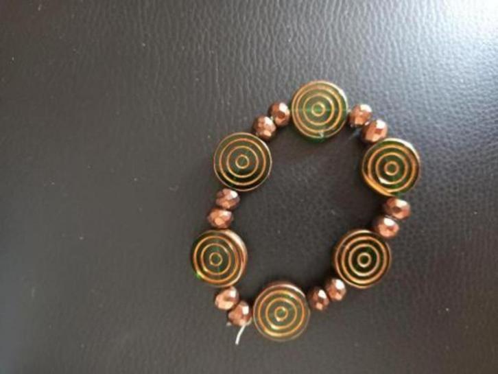 Armband., Sieraden, Tassen en Uiterlijk, Armbanden, Nieuw, Staal, Bruin, Ophalen of Verzenden