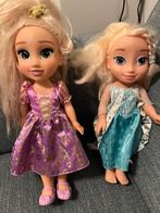 Frozen disney poppen rapunzel en Elza. 10,00 ps., Ophalen of Verzenden, Zo goed als nieuw, Pop